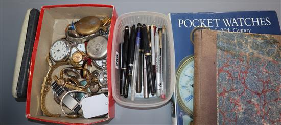 A 9ct. gold ladys watch, watch parts, pocket watch reference books and pens